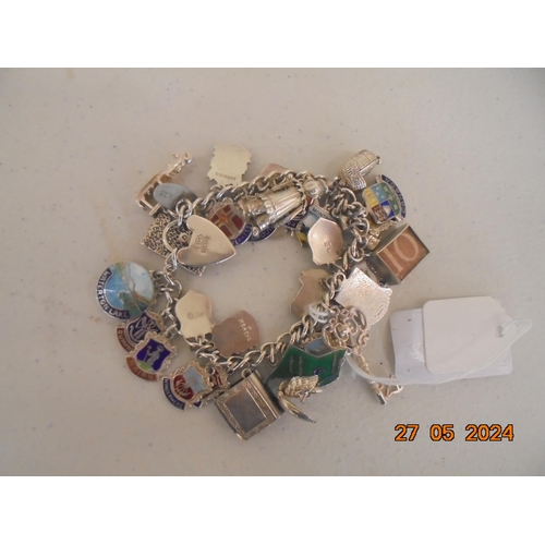 85 - Silver Charm Bracelet, 72 grams Total.