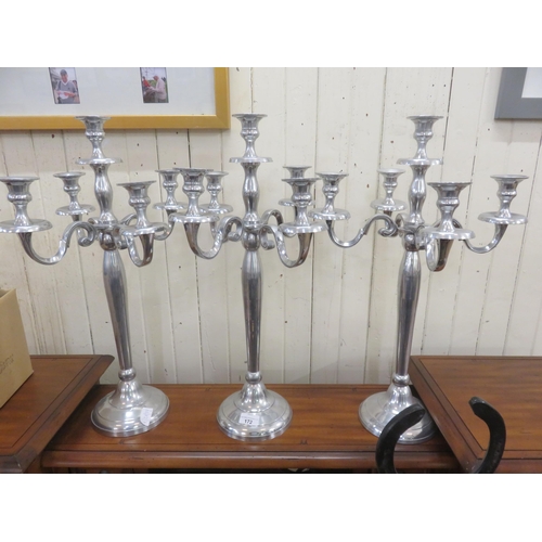 172 - Three White Metal Candelabra