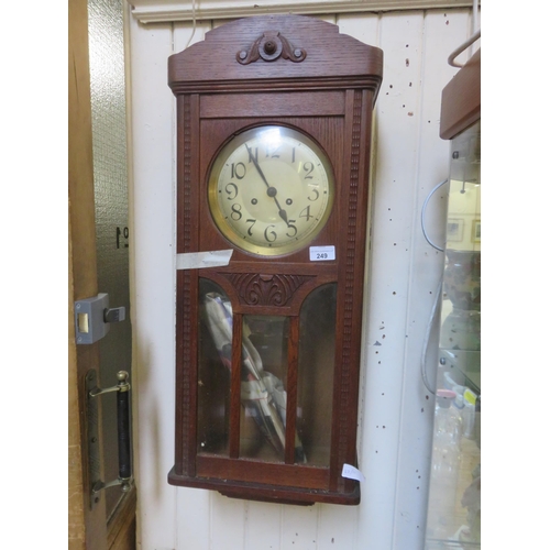 249 - Oak Cased Wall Hanging Clock