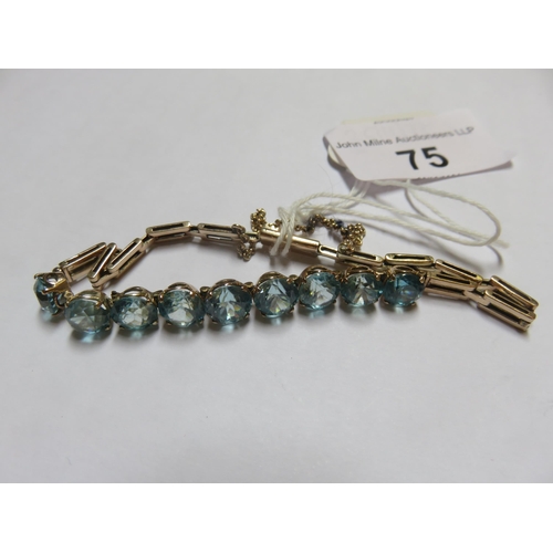 75 - 9ct Gold Bracelet Set with Nine Aquamarine Type Stones