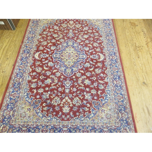 299 - Rug on Red Ground, One Centre Medallion With Blue Borders