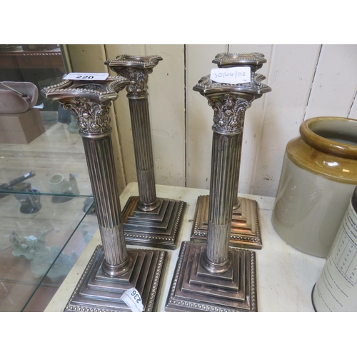 220 - Four Plated Candlesticks