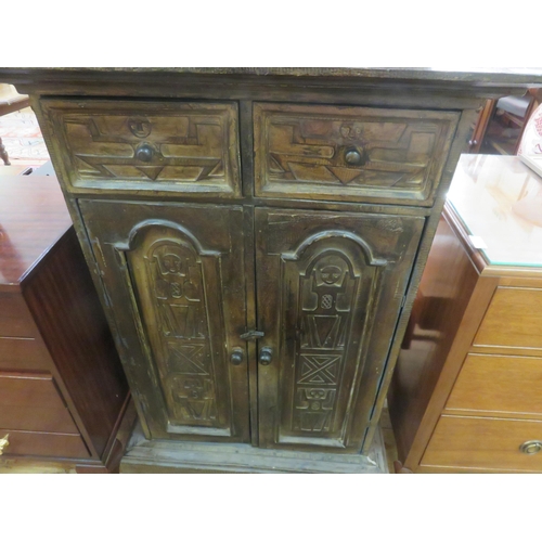 472 - Heavily Carved Two Door Tribal Cabinet