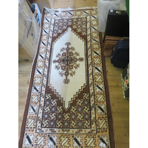 485 - Brown and Beige Fringed Rug