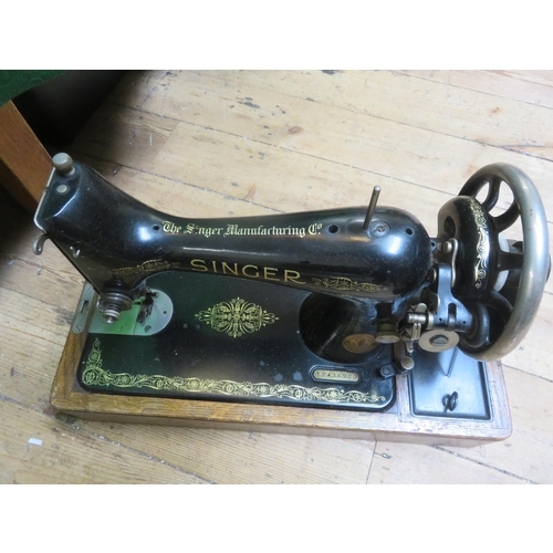 298 - Cased Singer Sewing Machine and Mantel Clock