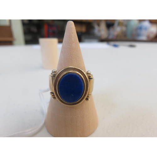 118 - Gold Dress Ring With Lapis Type Centre Stone