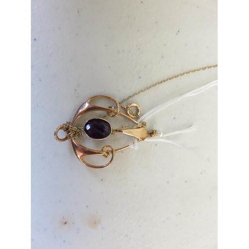 129 - 9ct Gold Amethyst and Seed Pearl Pendant