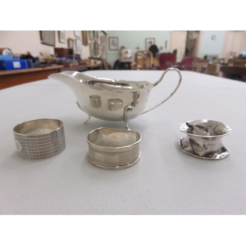 88 - Silver Gravy Boat and Three Silver Napkin Rings, 5 troy ozs.