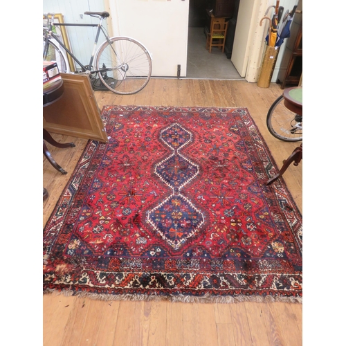 398A - Fringed Rug on Red Ground, Three Centre Medallions (Slight Damage)