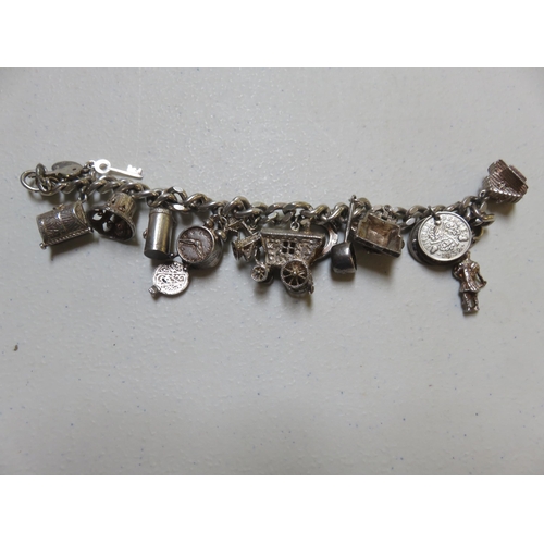 101 - Silver Charm Bracelet - 77gms