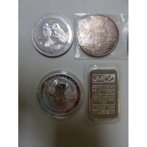 102 - Two Fine Silver Australian 1oz Coins, American Silver 1oz Coin and a 1oz Fine Silver Ingot