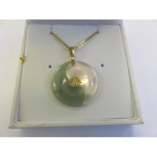 142 - 14k Gold Jadeite Mother of Pearl Pendant on Yellow Metal Chain