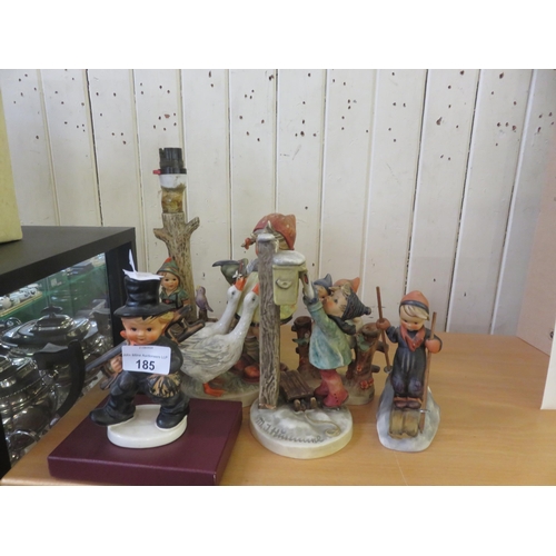 185 - Figural Hummel Lamp and Six Others