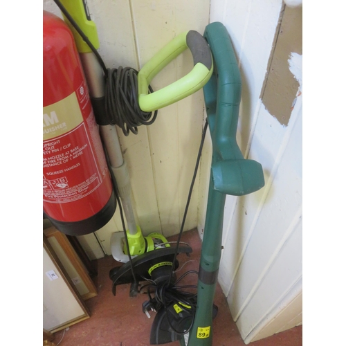 228 - Two Electric Garden Strimmers