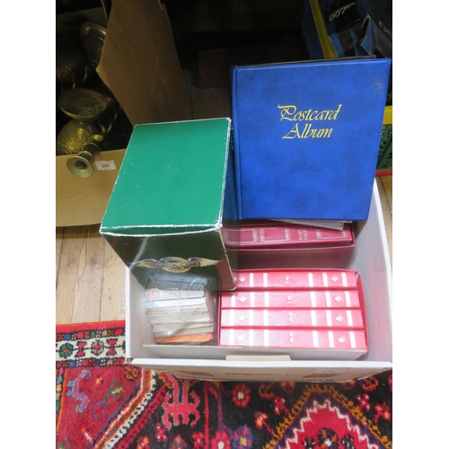 319 - Box of Postcard Albums, Classic Car Postcards, British and Commonwealth Stamps, Beer Coasters