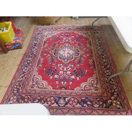 321 - Middle Eastern Rug on Red Ground - Centre Medallion Design