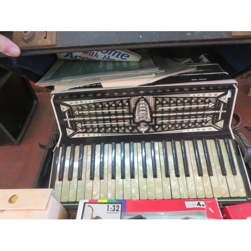 381 - Cased Estrella Luxe Accordian plus Sheet Music