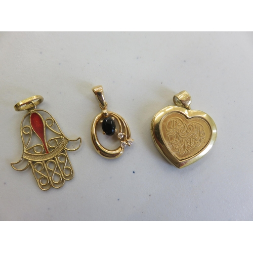 113 - Two 18ct Gold Pendants and a Gilt Metal Locket