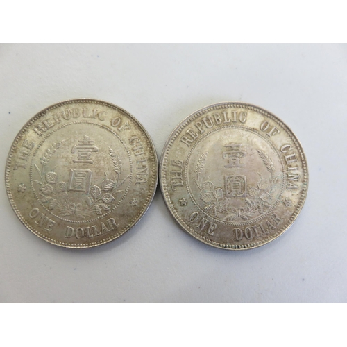 124 - Two Early 20th Century Chinese Silver One Dollar Coins