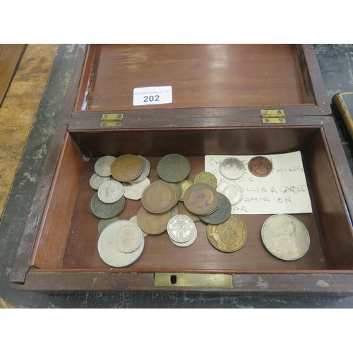 202 - Wooden box of assorted Coins