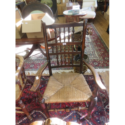 358 - Stained Wood Elbow Chair Ladder and Spindle Back, Rush Seat, Turned Wood Cross Stretcher