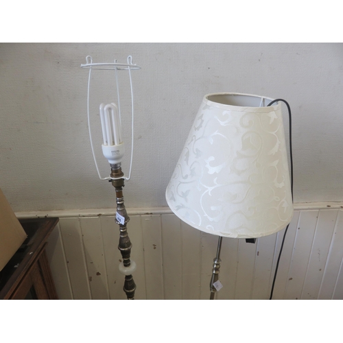 406 - Two Odd Standard Lamps