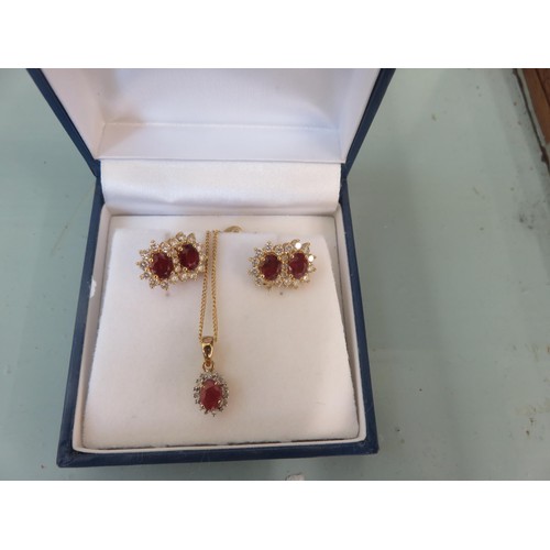 97 - Pair of 18ct Gold Ruby/Diamond Earrings and A Similar Silver Gilt Pendant on Chain.