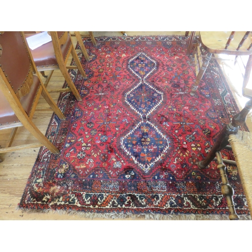 359A - Fringed Rug on Red Ground Three Centre Medallions (Slight Damage)