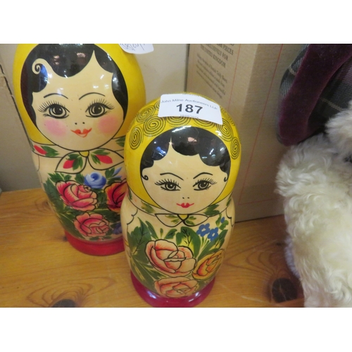 187 - Two Large Yellow and Red Russian Dolls