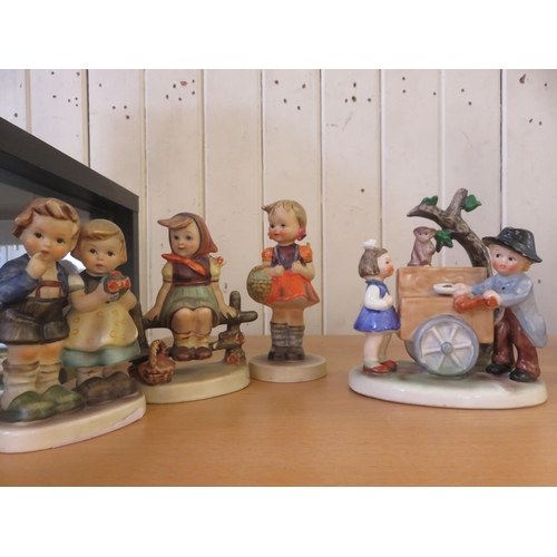 197 - Four Hummel Figures