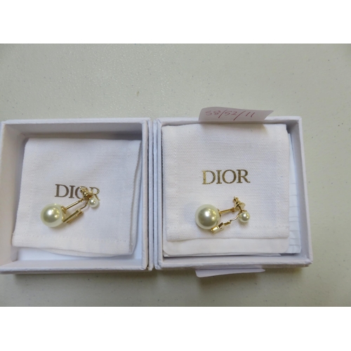 55 - Pair of Dior Tribal Star Pearl Earrings