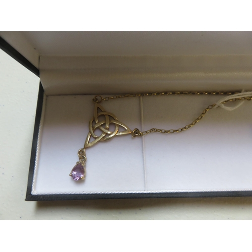 79 - 9ct. Gold Celtic Pendant with Amethyst Drop, 5 grams