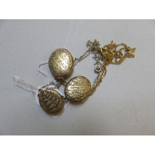 97 - Three Yellow Metal Lockets