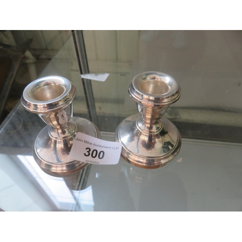 300 - Pair of Silver Dwarf Candlesticks