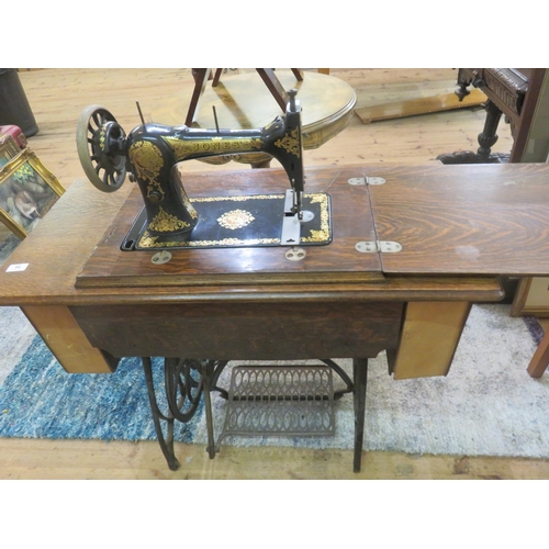 54 - Jones Treadle Sewing Machine