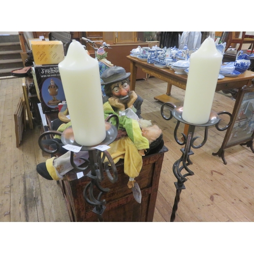 391 - Two Cast Iron Candle Holders