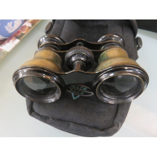 357 - Two pairs of Modern Binoculars and a pair of Opera Glasses