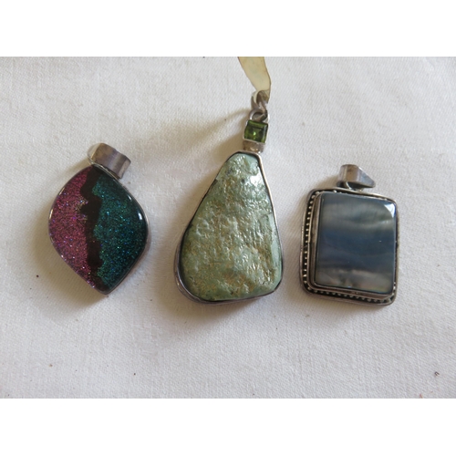 102 - Three Various Silver Pendants