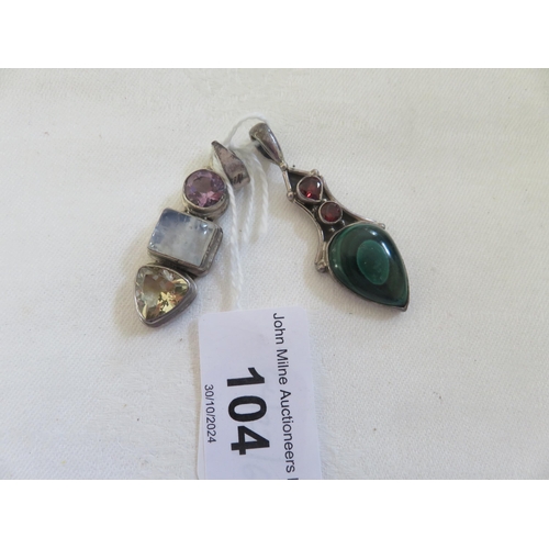 104 - Two Ornate Silver and Gemstone Pendants