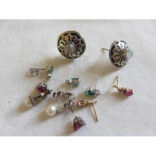 106 - Four Pairs of Earrings, Two Which are Stamped 10k and Three Loose Earrings