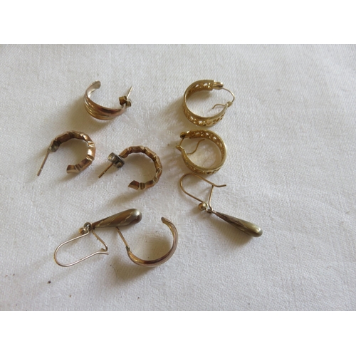 107 - Four Pairs of Yellow Metal Earrings