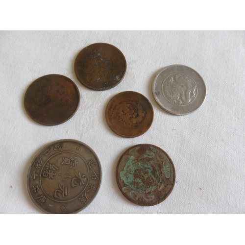 137 - Six various Chinese Coins