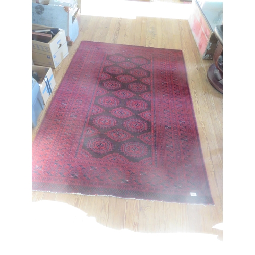 381 - Middle Eastern Rug on Red Ground, 190 x 130 cm.