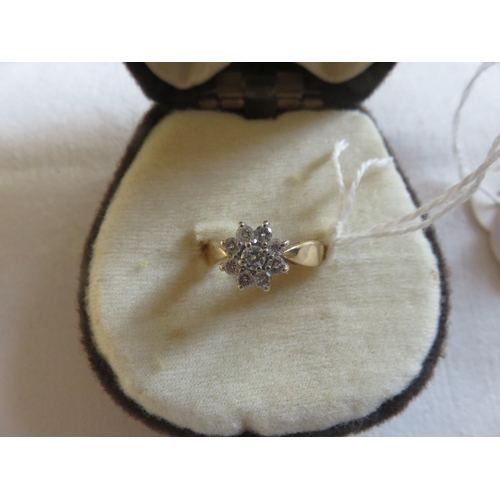 76 - 14K Gold Diamond Cluster ring