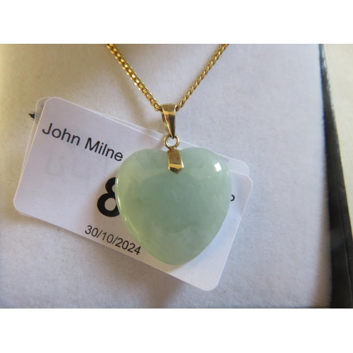 89 - 14K Gold and Jade Heart Pendant on Unmarked Yellow Metal Chain