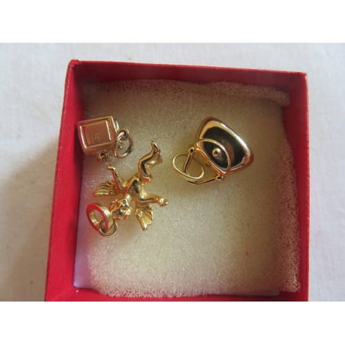 92 - Three 9ct Gold Charms