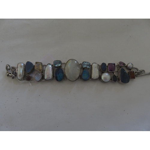 95 - Large Silver and Multi Gem Set Bracelet