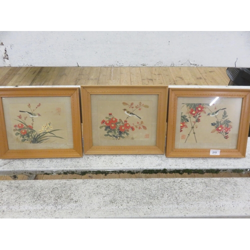 215 - Set of three framed Oriental Silk Pictures 