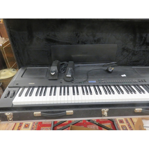 457 - Cased Yamaha Electric Piano P-200 with stand and pedals