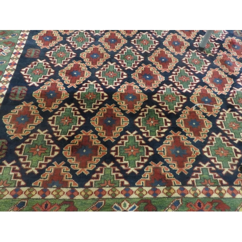 464 - Fringed Persian Rug, All Over Design on Green Ground, 180 x 152 cms.